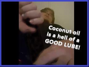 Watch this huge COCk slip down a lubbed up hand full of coconut oil