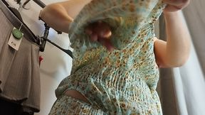 Sexy wife tries on clothes naked in the fitting room.