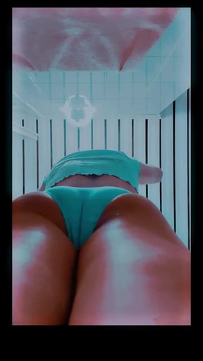 girl in blue bikini in bathroom close up