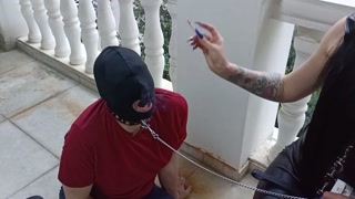 Slave ashtray. Smoking, spitting and slapping fetish