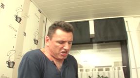 Attractive German maid in stockings rides dick in the kitchen