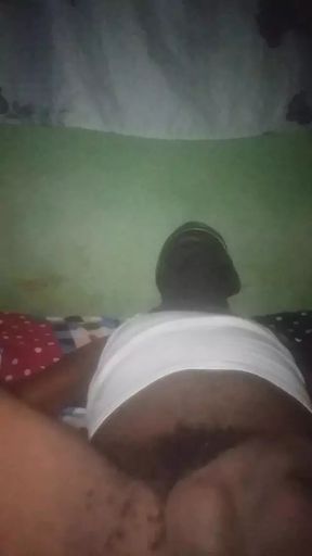 Flashing his big black ass.