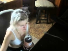 Hot short haired blonde freak bangs her pussy in the barn