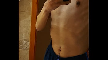 TUMMY PIERCED ARAB TEEN GUY SHOWS OFF HIMSELF IN THE MIRROR