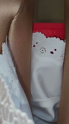 Long pink lined skirt with a white satin half slip.   Clip 1