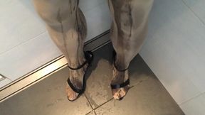 Pissing in shiny pantyhose an high heels sandals