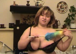 Magnificent white BBW babe in black lingerie and apron