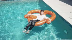 Taylor Takes a Pool Dip in Leather Pants and a Coat