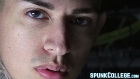 Inked twink teasing while stroking cock passionately solo