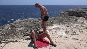 Blonde enjoys sex on the beach