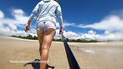 Walking on the beach in my short shorts with my big ass showing