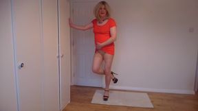 Red minidress, nude pantyhose and black high heels