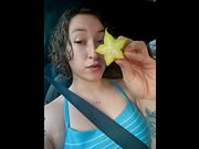 Eating a juicy star fruit