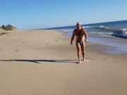 Beach walking in tiny bikini
