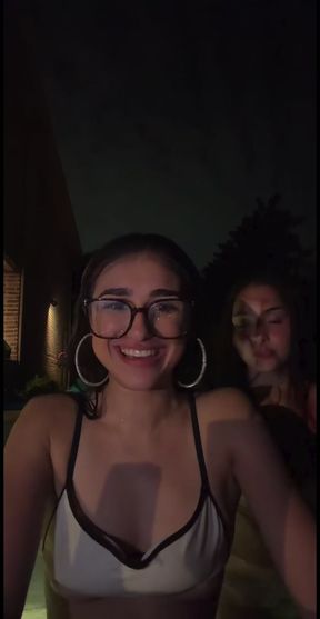 Swim suit-clad TikTok star takes a dip in an infinity pool