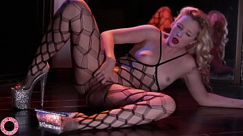 Sexy MILF Samantha Rone plays with herself in fishnets and lingerie