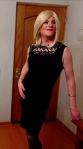 Crossdresser Fernanda Gomez trying on dresses