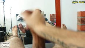 jerking off and shooting a nice cum load in front of the mirror.