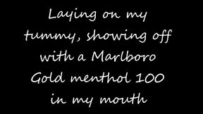 Laying on my tummy showing off while I smoke