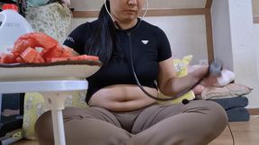 Watermelon belly exam: Hubby listening to my sloshing sounds~