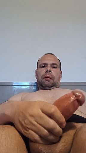 Cock massage with heating oil