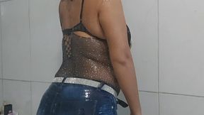 Hair whipping and hair washing in the shower in jeans