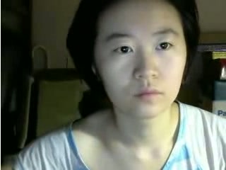 Asian serious or even dull looking webcam Asian whore exposed her tits