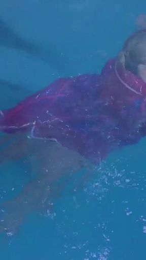 Swim & Play in Pvc Mac, Latex and Heels
