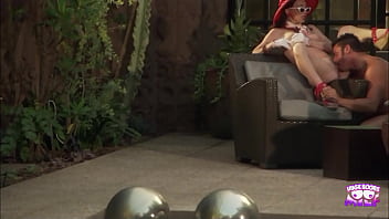 A super good looking brunette sitting by the pool and getting her cunt penetrated