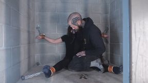 Elise Bound in Cell - Elise Graves and Heavy - Inmate Elise is chained with her arms and legs spread wide and is subjected to the creepy whims of her guard including being made to orgasm, tearing clothes, a crotch chain, and more.