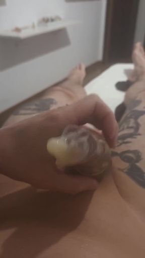 Jerking off and Cum in a Condom