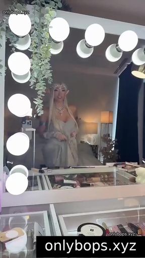 Makeup artist in front of mirror