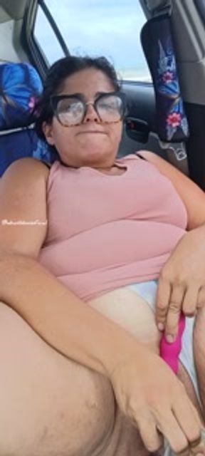 On a beach in Puerto Rico, in the car with the windows down, I put the dildo very tasty