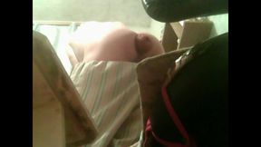 A Young Guy Is Sitting on a Chair with Anal Prolapse