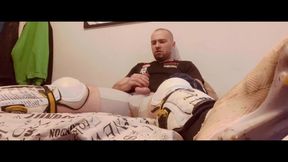 Jerk in Hockey shinpads Soccer cleats and Hockey mittens