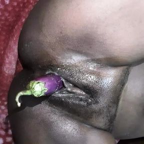 Hot desi Indian Bhabhi sex fucking with 9 inch brinjal with her step brother
