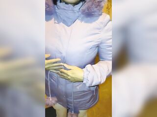 Aged woman wearing red thread in transparent leggings, captured on the street