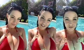 Big tits in the pool