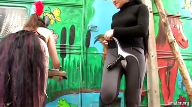 Lesbian strapon play in the woods and rustic dungeon with stockings and bondage