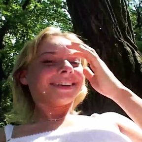 Sweet German teen pleasing her tight pussy in the woods