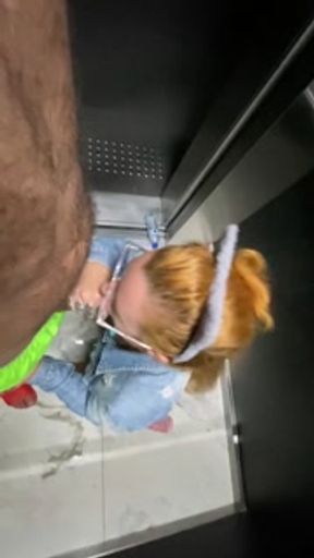Hot redhead is caught by surprise in the elevator and ends up dropping in her mouth before getting fucked in the pussy