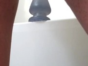 Ass swallows huge butt plug