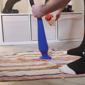 Caged Sissy fucked by long blue dildo