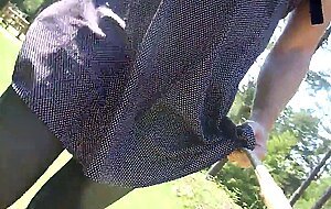 Crossdresser walking with butt plug in the forest