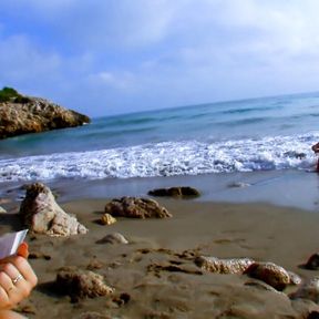 Blond woman fucks an unknown man on the beach