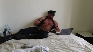 Leather hunk in chaps with gloves masturbating to porn (Paul Europe)