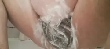 stepmom soaps her pussy and drips water on her vagina