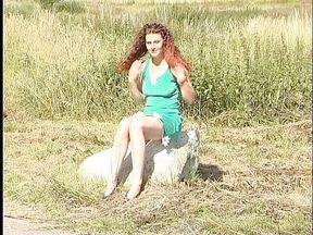 Busty redhead teen lifting dress outdoors