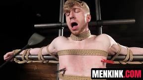 ”Kyler Drake makes Jesse Stone bite a gag as he drips sexy wax over him”