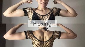 Sexy girl flexing muscles